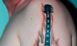 Tatuaż na gitarze na ramieniu.  Tatuaże na gitarze.  A kobiety najczęściej stosują tatuaże na gitarze